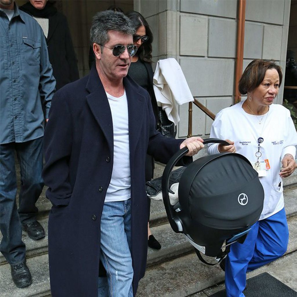 Simon Cowell with son Eric. Simon Cowell with son Eric.
